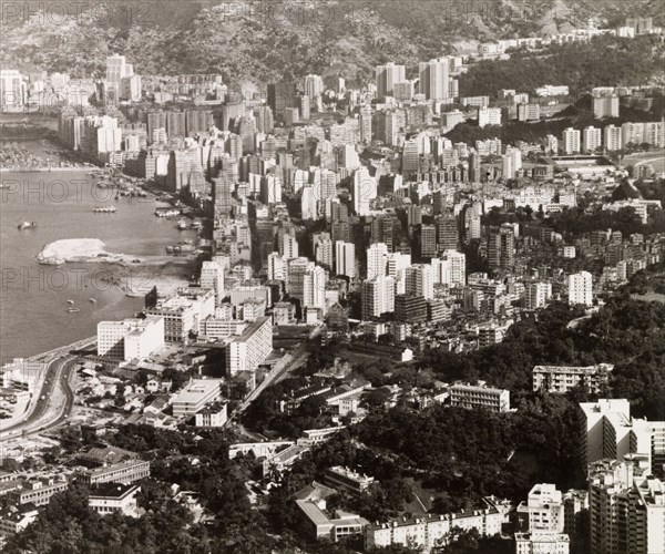 A forest of skyscrapers. A forest of skyscrapers fringes Victoria Harbour, stretching from the Central District to beyond Causeway Bay on northern shore of Hong Kong Island. Hong Kong, China, 1963. Hong Kong, Hong Kong, China, People's Republic of, Eastern Asia, Asia.