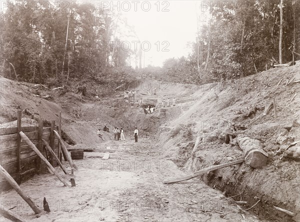 Tunnel under construction in Caparo Valley. View of the construction of railway track 'No. 84' and the entrance to a tunnel through Caparo Valley, part of the Rio Claro extension line built by Trinidad Government Railways. Trinidad, circa 1912., Trinidad and Tobago, Trinidad and Tobago, Caribbean, North America .