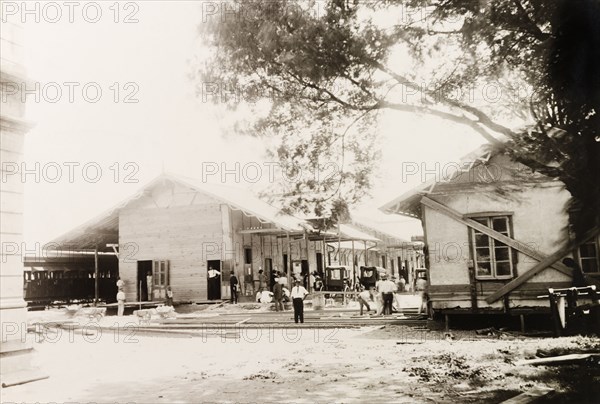 Extension work at the Port of Spain railway station. The telegraph office is removed during extension work at the Trinidad Government Railway terminal at Port of Spain. Port of Spain, Trinidad, 12 May 1914. Port of Spain, Trinidad and Tobago, Trinidad and Tobago, Caribbean, North America .