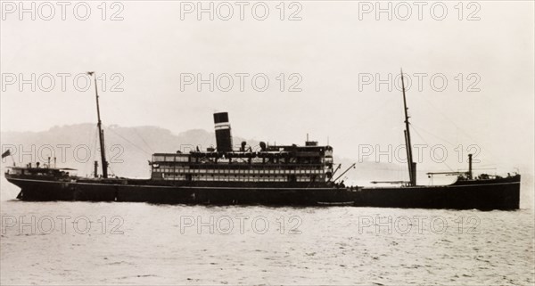 S.S. Domala. View of the passenger liner S.S. Domala. Launched in 1921, the steamer operated between London and Kolkata until it was bombed by the German Luftwaffe in the English Channel in 1940. The ship was salvaged and renamed Empire Attendant, and was eventually torpedoed south of the Canary Islands in 1942. Indian Ocean, October 1930., Indian Ocean, Africa.