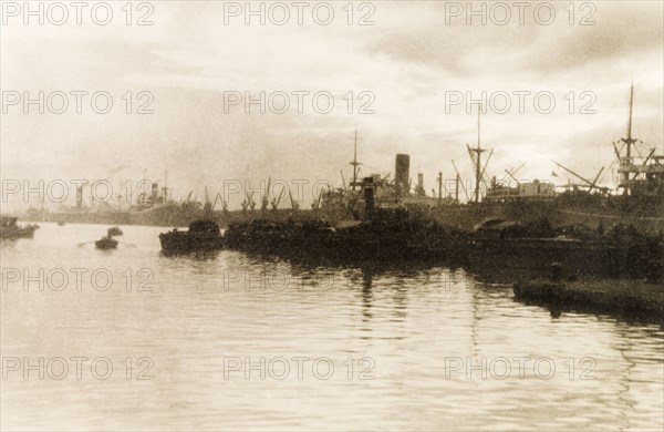 Moorings on the Hooghly River. Numerous vessels are stationed at moorings on the Hooghly River. Calcutta (Kolkata), India, circa 1931. Kolkata, West Bengal, India, Southern Asia, Asia.