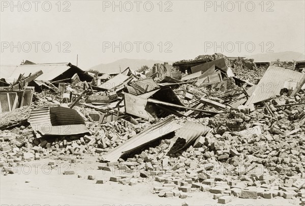 Buildings destroyed by an earthquake, Quetta. Buildings are reduced to rubble after an earthquake devastated the city of Quetta. The earthquake, measuring 7.7 on the Richter scale, hit Balochistan on 31 May 1935, and is thought to have killed between 30,000 to 60,000 people. Quetta, Balochistan, India (Pakistan), 1935. Quetta, Balochistan, Pakistan, Southern Asia, Asia.