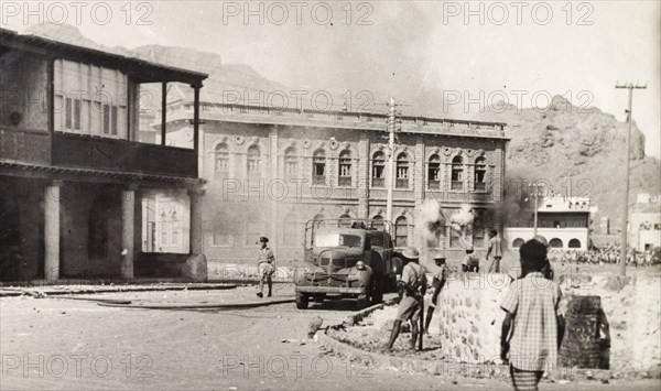 Arab riots in Aden, 1947. Smoke fills the air in the Jewish quarter of Aden, during Arab riots that took place in response to the United Nations Partition Plan for Palestine. Aden, Yemen, 1-3 December 1947. Aden, Adan, Yemen, Middle East, Asia.