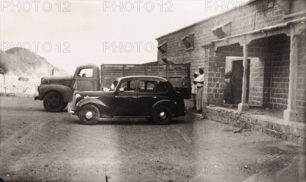 Patrol truck in the Aden riots, 1947. Armed police or soldiers climb into the back of a stationary patrol truck during Arab riots that took place in response to the United Nations Partition Plan for Palestine. Aden, Yemen, December 1947. Aden, Adan, Yemen, Middle East, Asia.