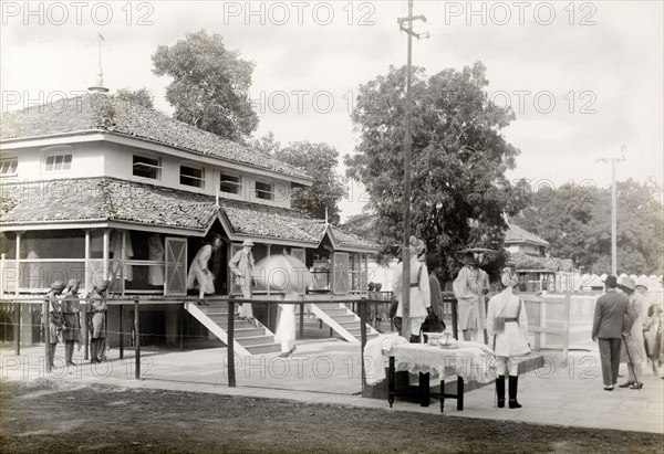 Nawab of Jaora's kennels. Lord Irwin, Viceroy of India, and his entourage are given a guided tour of the kennels owned by Muhammad Iftikhar Ali Khan, Nawab of Jaora. Jaora State, Malwa Agency (Madhya Pradesh), India, 3 August 1928., Madhya Pradesh, India, Southern Asia, Asia.