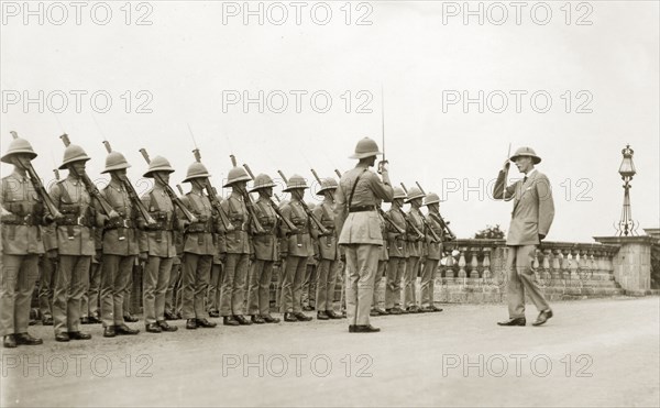 Lord Irwin inspecting the West Yorkshire Regiment. Lord Irwin, Viceroy of India, inspects a line up of the West Yorkshire Regiment (The Prince of Wales's Own) at the British cantonment town of Mhow. Mhow, Indore State (Madhya Pradesh), India, 1928. Indore, Madhya Pradesh, India, Southern Asia, Asia.