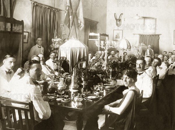 Regimental lunch at Mhow cantonment. British officers and their wives attend a regimental lunch at the cantonment at Mhow, held in honour of a state visit by Lord Irwin, Viceroy of India. Mhow, Indore State (Madhya Pradesh), India, 1928. Indore, Madhya Pradesh, India, Southern Asia, Asia.