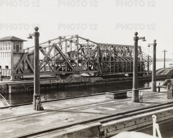 Emergency dam on the Panama Canal. An emergency dam on the Panama Canal, built as a secondary defence against flooding. Dams such as these were replaced by hydraulic versions in the late 1930s. Panama, circa 1930. Panama, Central America, North America .