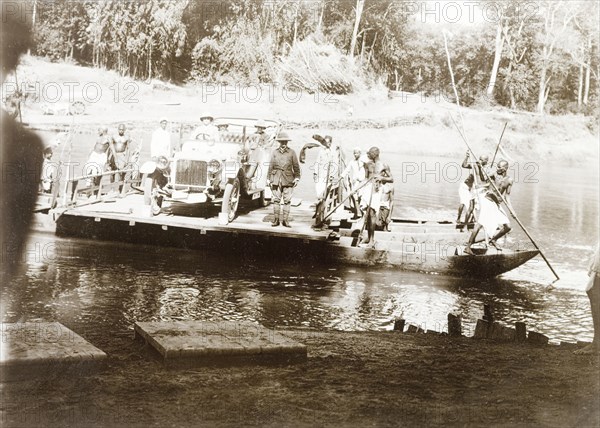 Ferry crossing on the Karempoja River. Sir Arthur Lawley, the Governor of Madras, and his touring party are ferried across the Karempoja (Karimpuzha) River in their Daimler car. The group were travelling from Edakkara to Calicut (Kozhikode). Malabar District (Kerala), India, March 1908., Kerala, India, Southern Asia, Asia.