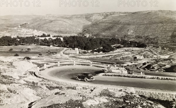 Seven Sisters' road in Jerusalem. View of a road nicknamed the 'Seven Sisters', winding through the hills of Jerusalem. Jerusalem, British Mandate of Palestine (Israel), circa 1942. Jerusalem, Jerusalem, Israel, Middle East, Asia.