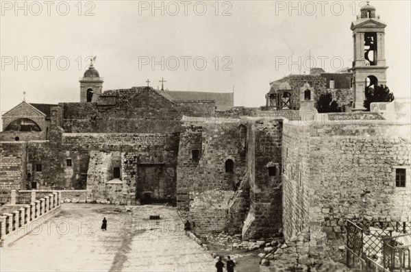 Church of the Nativity, Bethlehem. View of the Church of the Nativity, a Christian church traditionally believed to be built over Jesus' birthplace. Currently administered by a coalition of Roman Catholic, Greek Orthodox and Armenian Apostolic clerics, the site is sacred to all followers of Christianity and Islam. Bethlehem, British Mandate of Palestine (West Bank, Middle East), circa 1942. Bethlehem, West Bank, West Bank (Palestine), Middle East, Asia.