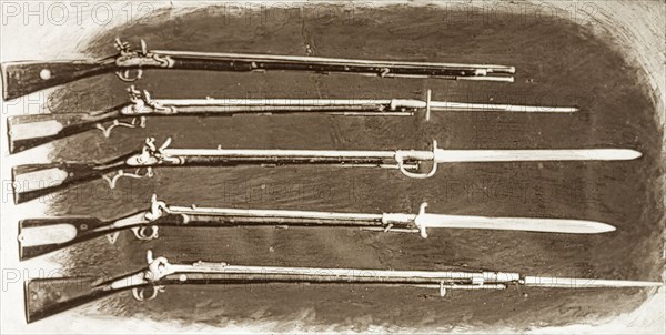 Muskets used during the Indian Mutiny and Rebellion . An illustration depicts a collection of muskets of the type used by Indian sepoys during the Indian Mutiny and Rebellion (1857-58). These include the Brown Bess (or British Army's Land Pattern Musket) and the Enfield Rifled Musket (or Pattern 1853 Enfield). India, circa 1858. India, Southern Asia, Asia.