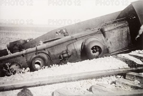 Derailment at Ras el Ain. A steam locomotive lies upturned on a railway embankment, derailed in a sabotage attack by Palestinian Arab dissidents during the Great Uprising (1936-39). Ras el Ain, British Mandate of Palestine (Israel), circa 1938. Israel, Middle East, Asia.