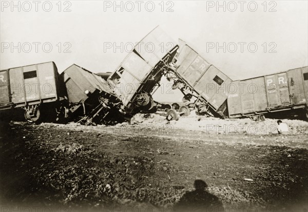 Derailed freight cars at Lydda. Several freight cars lie in a tangled heap, derailed in a sabotage attack by Palestinian Arab dissidents during the Great Uprising (1936-39). Lydda, British Mandate of Palestine (Lod, Israel), circa 1938. Lod, Central (Israel), Israel, Middle East, Asia.