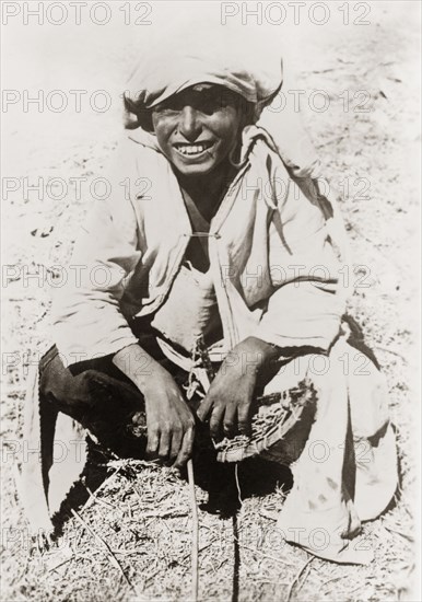 Portrait of a young Arab man, Palestine. Portrait of a young Arab man in traditional dress. British Mandate of Palestine (Middle East), circa 1938., Middle East, Asia.