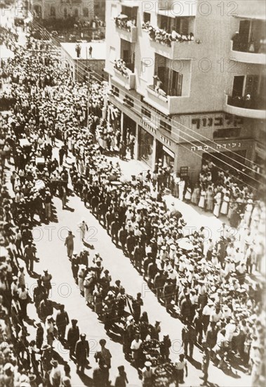 Funeral procession in Tel Aviv. A military escort accompanies a funeral procession during the Great Uprising (1936-139). Tel Aviv, British Mandate of Palestine (Israel), circa 1938., Tel Aviv, Israel, Middle East, Asia.