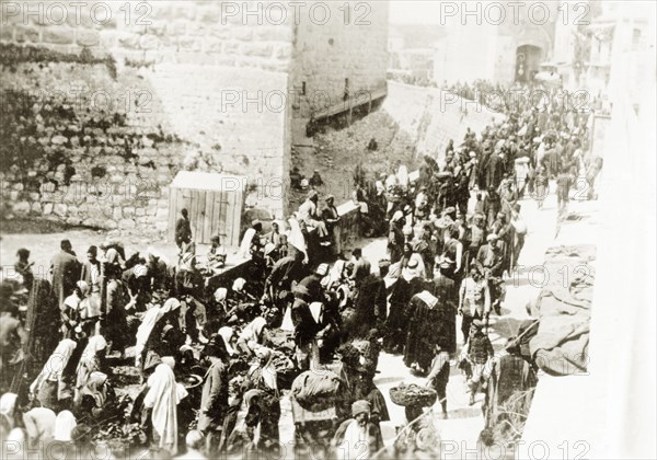 Ramallah on the day of a Nebi Musa procession. Crowds of people throng the streets of Ramallah on the day of a Nebi Musa procession: an annual pilgrimage made by Palestinian Muslims to Nebi Musa near Jericho, the supposed burial place of Moses. Ramallah, British Mandate of Palestine (West Bank, Middle East), circa 1938. Ramallah, West Bank, West Bank (Palestine), Middle East, Asia.