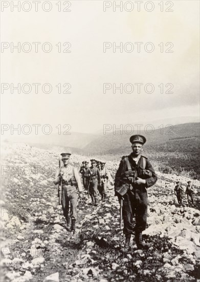 British soldiers patrolling the Palestinian hills. Soldiers of the Royal Ulster Rifles, an Irish infantry regiment of the British Army, patrol the Palestinian hills. During the period of the Great Uprising (1936-39), an additional 20,000 British troops were deployed to Palestine in an attempt to clamp down on Arab dissidence. British Mandate of Palestine (Middle East), circa 1938., Middle East, Asia.