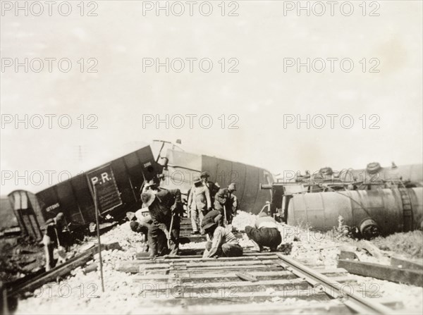 Repairing the Kantara line after a derailment. Labourers attempt to repair a stretch of the Kantara line following a derailment caused by Palestinian Arab dissidents during the Great Uprising (1936-39). British Mandate of Palestine (Middle East), circa 1938., Middle East, Asia.