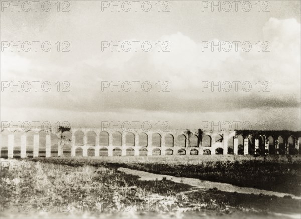 Roman aqueduct near Acre. The remains of a Roman aqueduct near Acre, which once brought freshwater to the port city from springs located at Cabri (Kabri). Near Acre (Akko), British Mandate of Palestine (Northern Israel), circa 1938. Akko, North (Israel), Israel, Middle East, Asia.