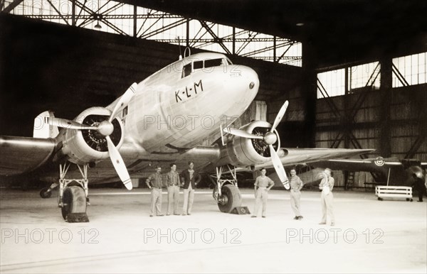 KLM Royal Dutch Airlines aeroplane. A KLM Royal Dutch Airlines aeroplane, the PH-ALV 'Valk', sits in a hangar at Lydda Airport. Lydda, British Mandate of Palestine (Lod, Israel), circa 1938. Lod, Central (Israel), Israel, Middle East, Asia.