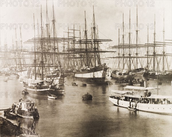 East Indiamen on the Hooghly River. A number of East Indiamen sailing ships are moored on the Hooghly River alongside several smaller pilot boats. Calcutta (Kolkata), India, circa 1887. Kolkata, West Bengal, India, Southern Asia, Asia.