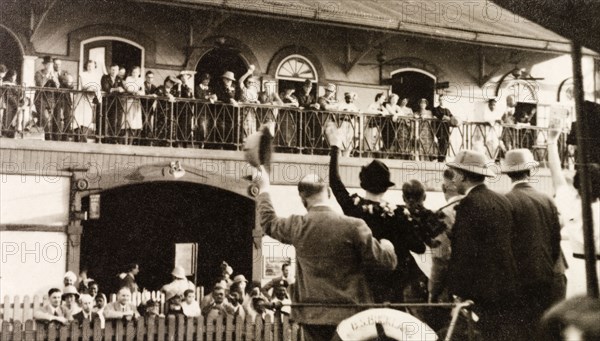 Leaving Outram Ghat, Calcutta. Passengers wave goodbye from the deck of British India Steam Navigation Company cargo vessel 'Mulbera' as they leave Outram Ghat bound for Colombo in Ceylon (Sri Lanka). Calcutta (Kolkata), India, January 1939. Kolkata, West Bengal, India, Southern Asia, Asia.