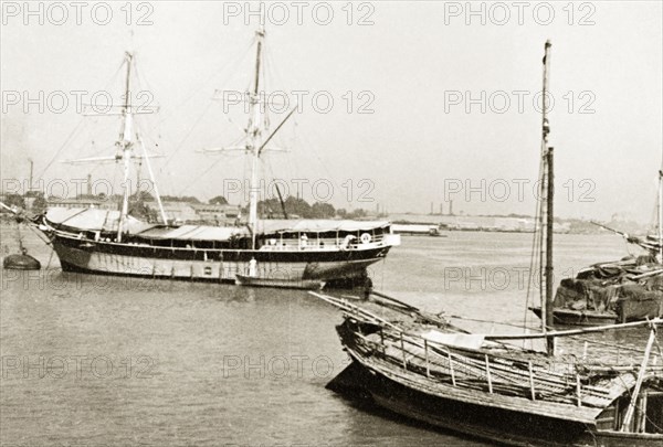 A Malabar schooner at Colombo. A Malabar schooner, designed by American naval architect John Alden, is moored in a harbour at Colombo. Colombo, Ceylon (Sri Lanka), January 1939. Colombo, West (Sri Lanka), Sri Lanka, Southern Asia, Asia.