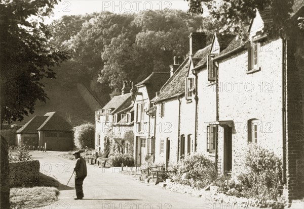 Village of East Dean, Sussex. A row of cottages on a sleepy residential street in East Dean, a village situated in a valley of the South Downs. East Dean, Sussex, England, April 1939., Sussex, England (United Kingdom), Western Europe, Europe .