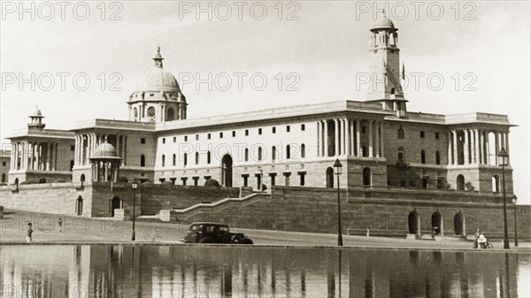 Secretariat building, Delhi. The Secretariat building in Delhi, one of a set of two buildings designed by British architect Sir Herbert Baker to accompany the Rashtrapati Bhavan (the official residence of the President of India). Built between 1912 to 1931 in a combination of Mughal and Rajputana architectural styles, the building is now used as Indian Government offices. Delhi, India, 1941. Delhi, Delhi, India, Southern Asia, Asia.