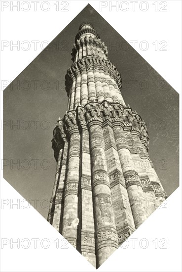 Qutb Minar, 1941. View of the Qutb Minar, one of the greatest monuments of Islamic architecture in India. At 72.5 metres tall, it was built as a celebratory victory tower to accompany the Quwwat-ul-Islam mosque, and was probably inspired by the style of Afghan minarets. Delhi, India, 1941. Delhi, Delhi, India, Southern Asia, Asia.