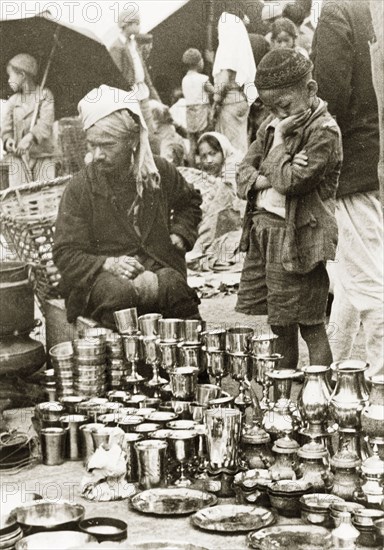 Silverware stall at Darjeeling market. A silverware stall at Darjeeling market. Darjeeling, India, 1942. Darjeeling, West Bengal, India, Southern Asia, Asia.
