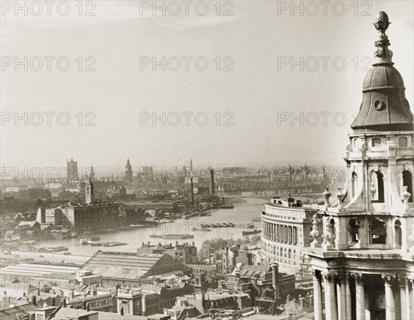 View over the City of London, 1945. View over the River Thames and the City of London, taken from the top of St Paul's Cathedral at the close of World War II. Although struck twice by enemy bombs in October 1940 and April 1941, the cathedral managed to survive the Blitz, which saw the destruction of more than a million houses in the city. London, England, 1945. London, London, City of, England (United Kingdom), Western Europe, Europe .