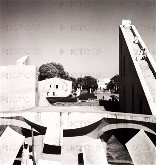 Yantra Mandir, Delhi. Visitors climb a staircase leading to the giant equinoctial dial at Yantra Mandir (or Jantar Mantar), an astronomical observatory built by Maharajah Jai Singh II in the early 18th century. Delhi, India, 1943. Delhi, Delhi, India, Southern Asia, Asia.