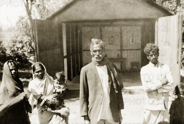 Church at Indian coffee estate. Plantation workers at 'Maskal Maradi' coffee estate stand outside a Christian church converted from a garage. Chikmagalur, Mysore State (Chikkamagaluru, Karnataka), India, 1936., Karnataka, India, Southern Asia, Asia.