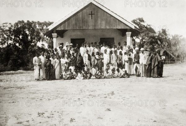 Church at 'Maskal Maradi' coffee estate. Plantation workers and their families pose outside a Christian church converted from a garage at 'Maskal Maradi' coffee estate. Chikmagalur, Mysore State (Chikkamagaluru, Karnataka), India, 1936., Karnataka, India, Southern Asia, Asia.