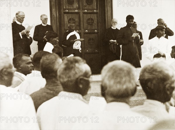 Dedication of Tumkur seminary chapel. Indian and European missionaries address a seated audience at the dedication ceremony of Tumkur Methodist seminary chapel. Tumkur, Mysore State (Tumakuru, Karnataka), India, June 1932., Karnataka, India, Southern Asia, Asia.