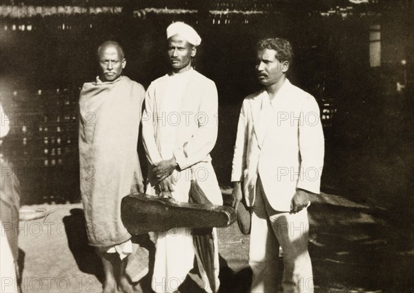 Methodist evangelist musicians. Two members of a Methodist evangelist band, one holding a violin case, during a visit to a rural Indian village. Karnataka, India, circa 1933., Karnataka, India, Southern Asia, Asia.