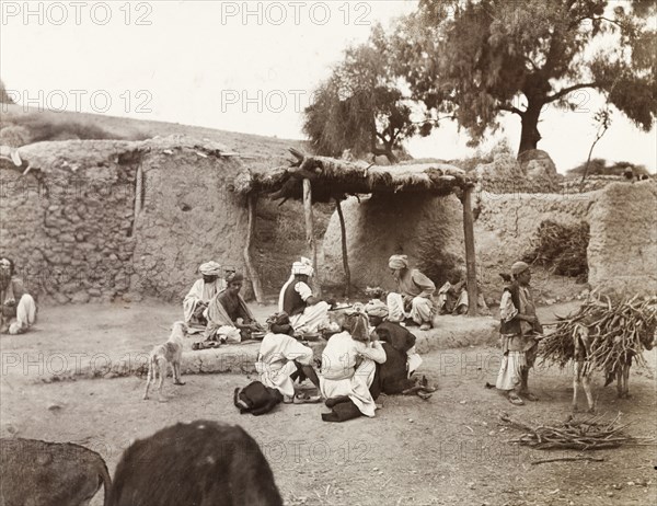 Street scene in a North West Frontier village. Street scene from a village on the road from Kohat to Peshawar. North West Frontier Province, India (Pakistan), February 1903., North West Frontier Province, Pakistan, Southern Asia, Asia.