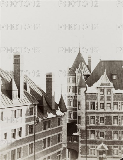 Chateau Frontenac, Quebec. View of the turreted Chateau Frontenac, a grand hotel built in 1893 in a combination of Scottish baronial and French Chateau architectural style. It was designed by American architect Bruce Price for the Canadian Pacific Railway company in order to entice wealthy travellers and encourage luxury tourism to its trains. Quebec, Canada, February 1902. Quebec, Quebec, Canada, North America, North America .