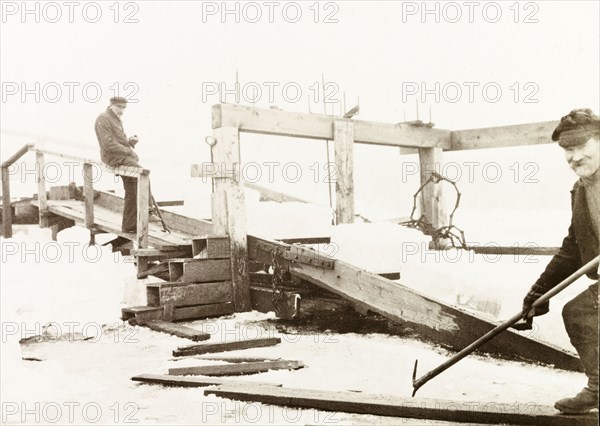 Ice cutters, Canada. Two ice cutters at work removing ice from Lake Ontario. Hamilton, Canada, February 1902. Hamilton, Ontario, Canada, North America, North America .