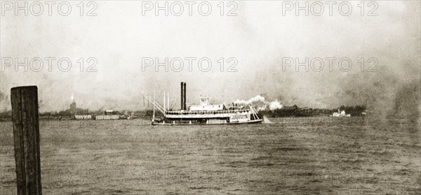 Grain boat, Mississippi'. A steamship carrying a shipment of grain travels along the Mississippi River. New Orleans, United States of America, March 1902. New Orleans, Louisiana, United States of America, North America, North America .