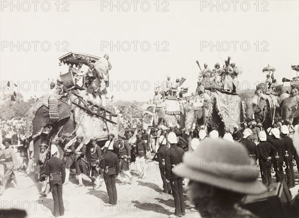Procession of elephants at Coronation Durbar, 1903. A procession of caparisoned elephants bearing ornate howdahs at Edward VII's Coronation Durbar. Delhi, India, circa 1 January 1903. Delhi, Delhi, India, Southern Asia, Asia.