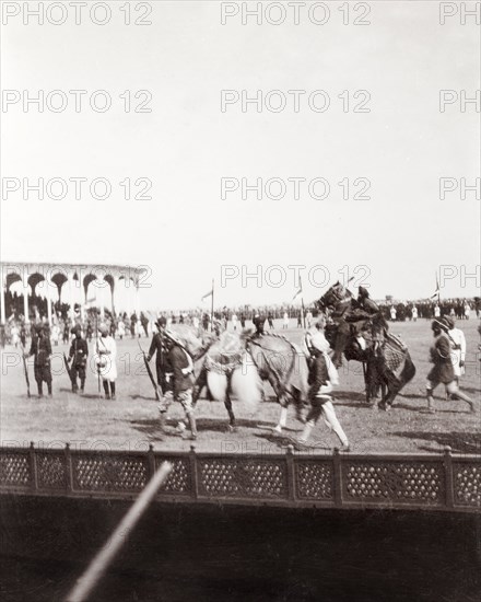 Horse show at Coronation Durbar, 1903. Horsemen from Jaipur State perform a dressage show in the pavilion arena at Edward VII's Coronation Durbar. Delhi, India, circa 1 January 1903. Delhi, Delhi, India, Southern Asia, Asia.