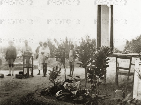 Magic lantern projector, 1937. Methodist evangelists set up a magic lantern projector and screen at a coffee estate to show a display of slides to the plantation workers. Mysore State (Karnataka), India, 1937., Karnataka, India, Southern Asia, Asia.