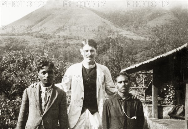 Missionaries at 'Doopadcool Estate'. British missionary Reverend Norman Sargant poses with two Methodist evangelists, J.A. Dennisann and Monahan Peter, at 'Doopadcool Estate' following a baptism ceremony. Mysore State (Karnataka), India, 1938., Karnataka, India, Southern Asia, Asia.