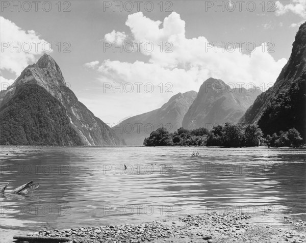 Mitre Peak at Milford Sound. View of Mitre Peak (left) at Milford Sound. Southland, New Zealand, 1966., Southland, New Zealand, New Zealand, Oceania.