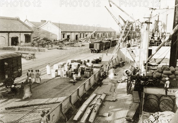 A cargo of Italian war supplies at Suez. Italian war supplies are loaded onto a ship, ready to be transported along the Suez Canal to Abyssinia (Ethiopia) during the Second Italo-Abyssinian War (1935-36). Suez, Egypt, January 1936. Suez, Suez, Egypt, Northern Africa, Africa.