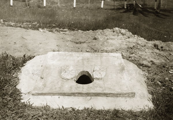 Basic toilet at Keningau Health Centre. Temporary toilet at Keningau Health Centre. Health officers were trained by British medical officers at the centre to introduce new hygiene and sanitation practices to local villages. Keningau, North Borneo (Sabah, Malaysia), circa 1937. Keningau, Sabah (North Borneo), Malaysia, South East Asia, Asia.