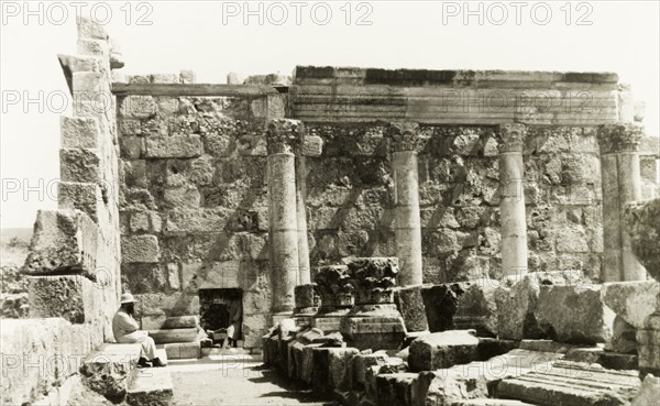 The 'White Synagogue' at Capernaum. Fragments of carved stone capitals and columns lie within the ruins of the fourth century 'White Synagogue' at Capernaum. Capernaum, British Mandate of Palestine (Israel), December 1939. Capernaum, North (Israel), Israel, Middle East, Asia.